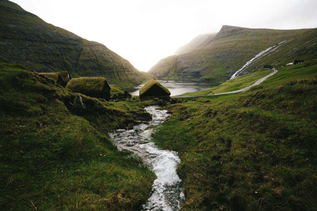 The river doesn’t rush—yet it carves through stone.